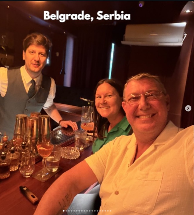Aaron, Amanda, and a bartender at a cocktail bar in Belgrade, Serbia