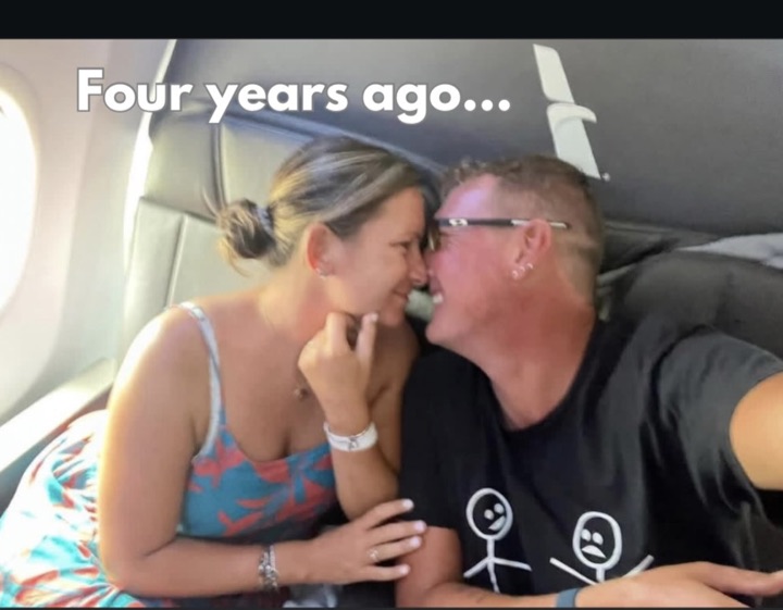 Aaron and Amanda on a flight, captioned 'Four years ago...'